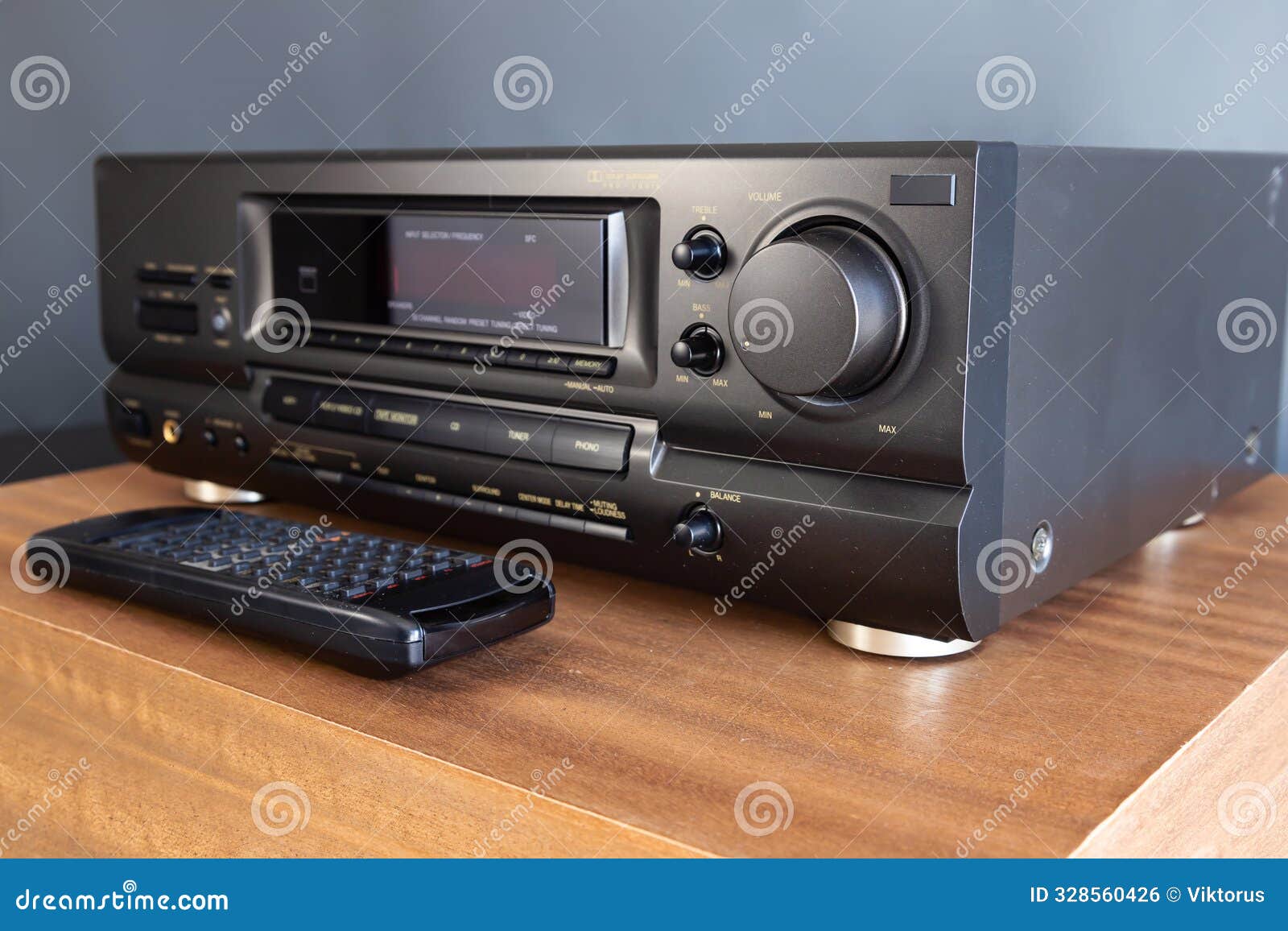 stereo audio video receiver with volume knob closeup, stereo gear from 90's