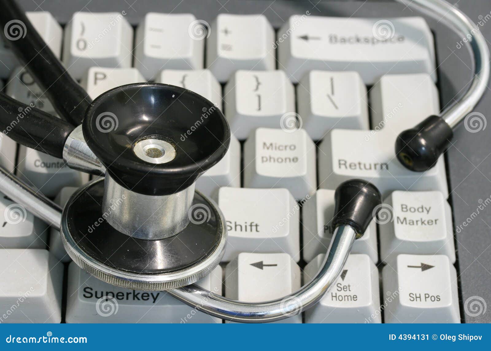 Stethoscope and keyboard stock image. Image of enter, urgency 4394131