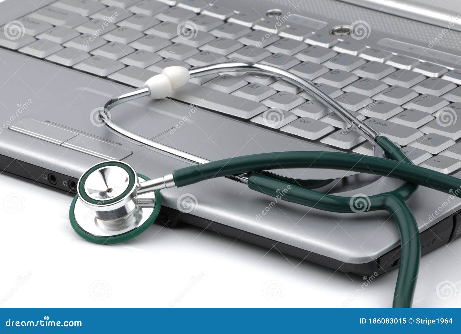 Stethoscope Next To a Laptop Signifying the Relationship of Information