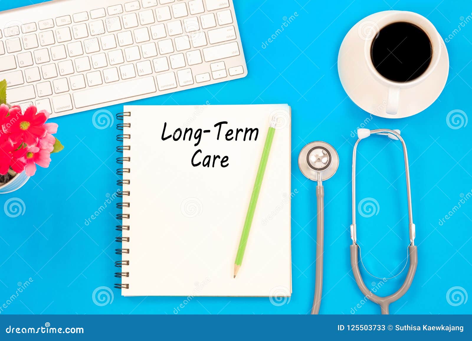 stethoscope on notebook and pencil with long term care words as