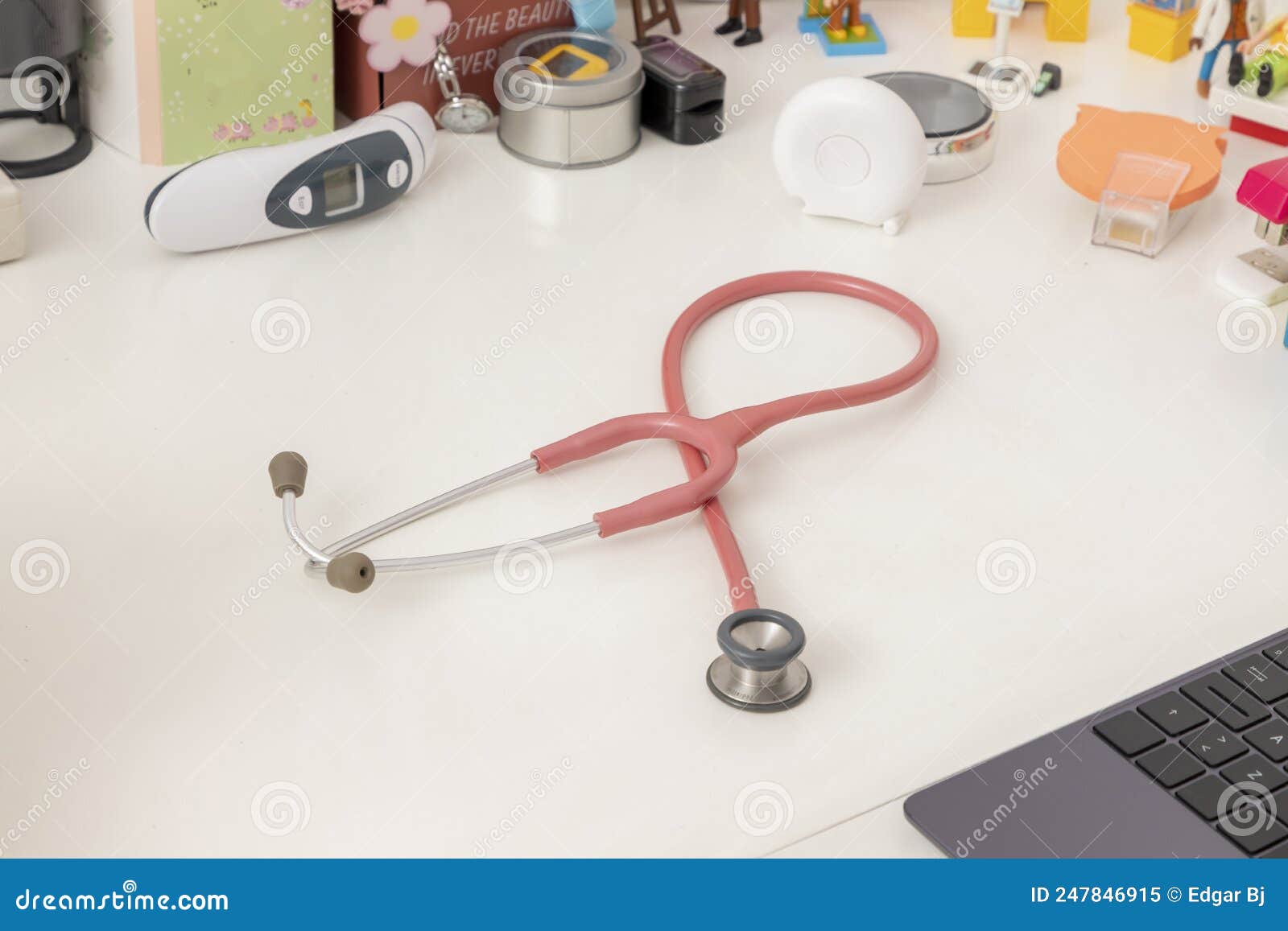 stethoscope and pediatric equipment, on the desk of a pediatric office