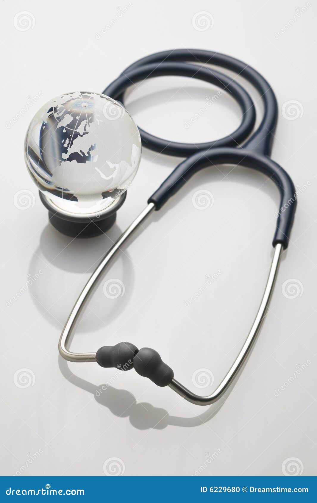 Stethoscope and a Small Crystal Globe Stock Photo Image of sphere, monochromatic 6229680