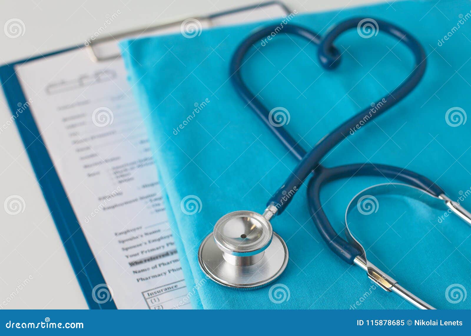 Stethoscope on a Table with Medical Uniform Stock Image Image of
