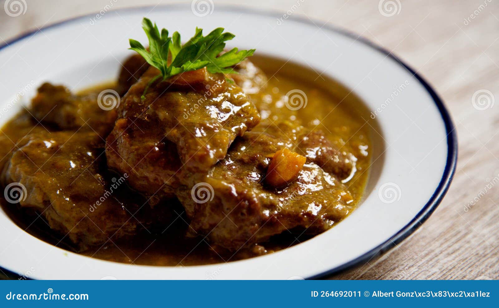 Stewed Beef Cheek with Red Wine Sauce and Vegetables. Stock Image