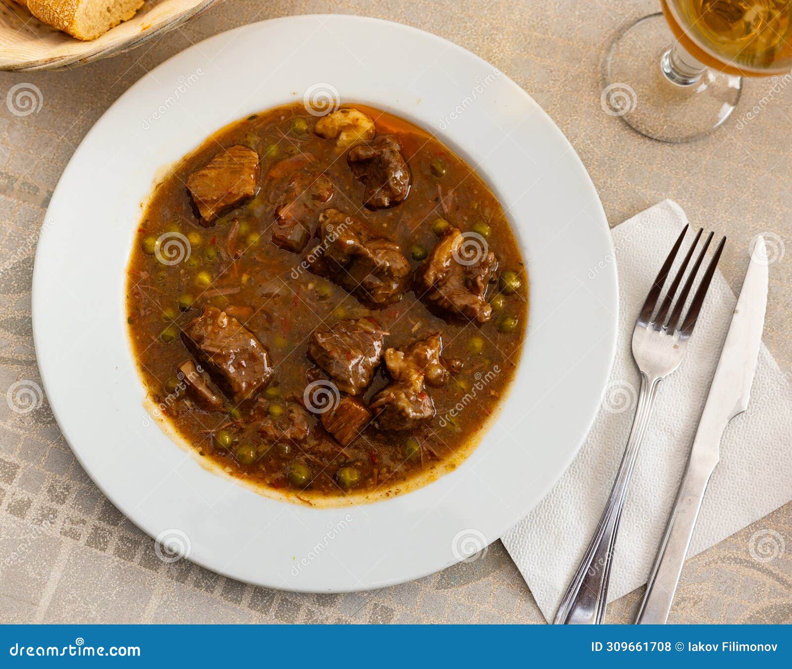 stewed beef with vegetables (ternera la jardinera) - this is spanish traditional meat dish