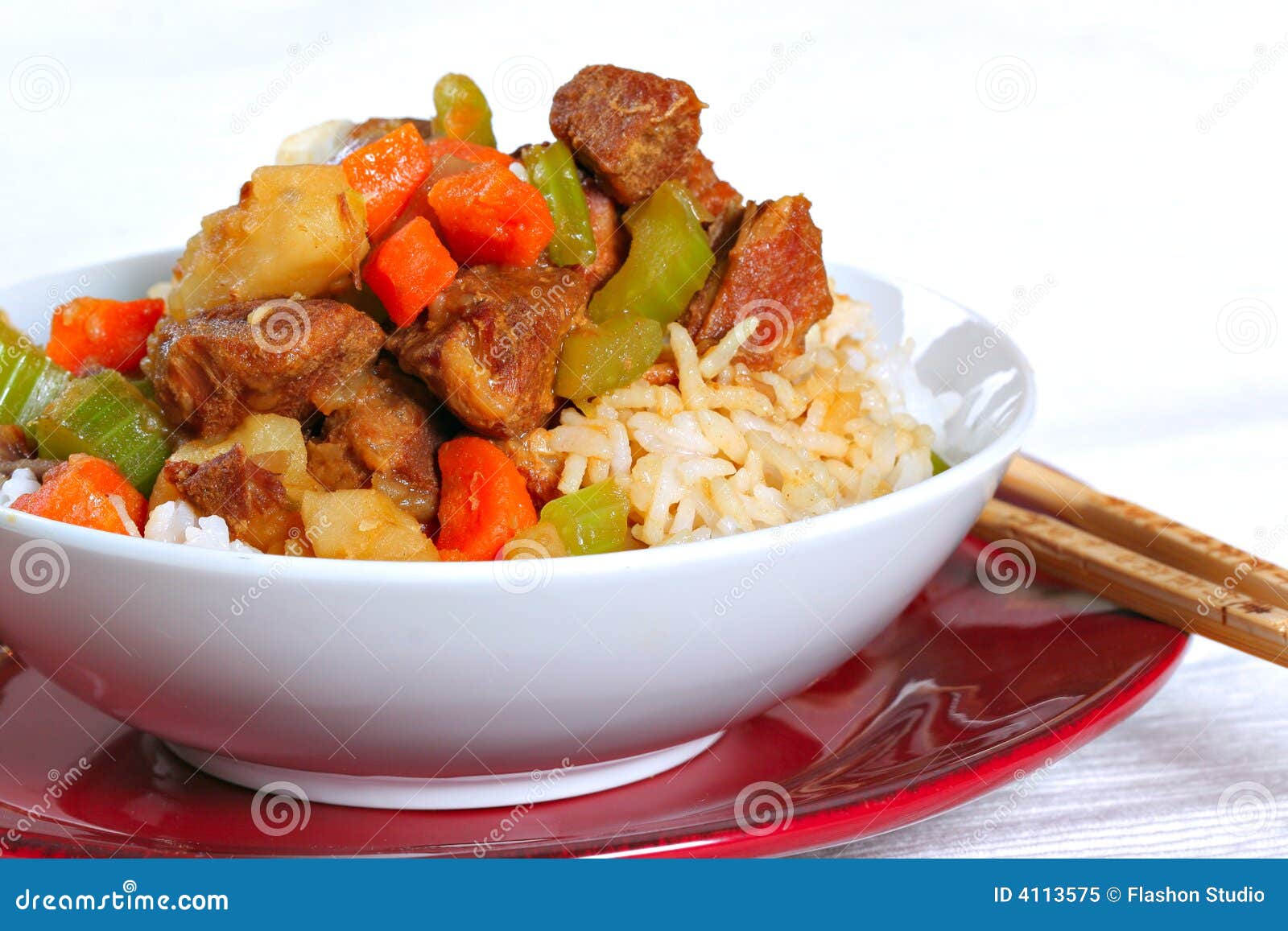 Stewed pork over rice stock image. Image of bowl, plate 4113575