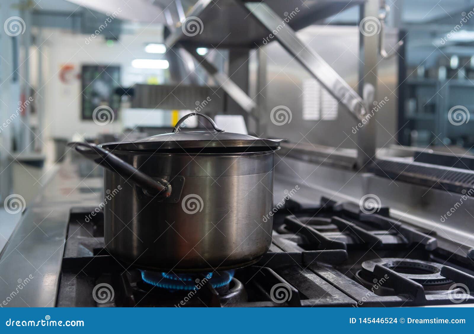 A Stewpot Getting Cooked on Stove Stock Photo Image of equipment
