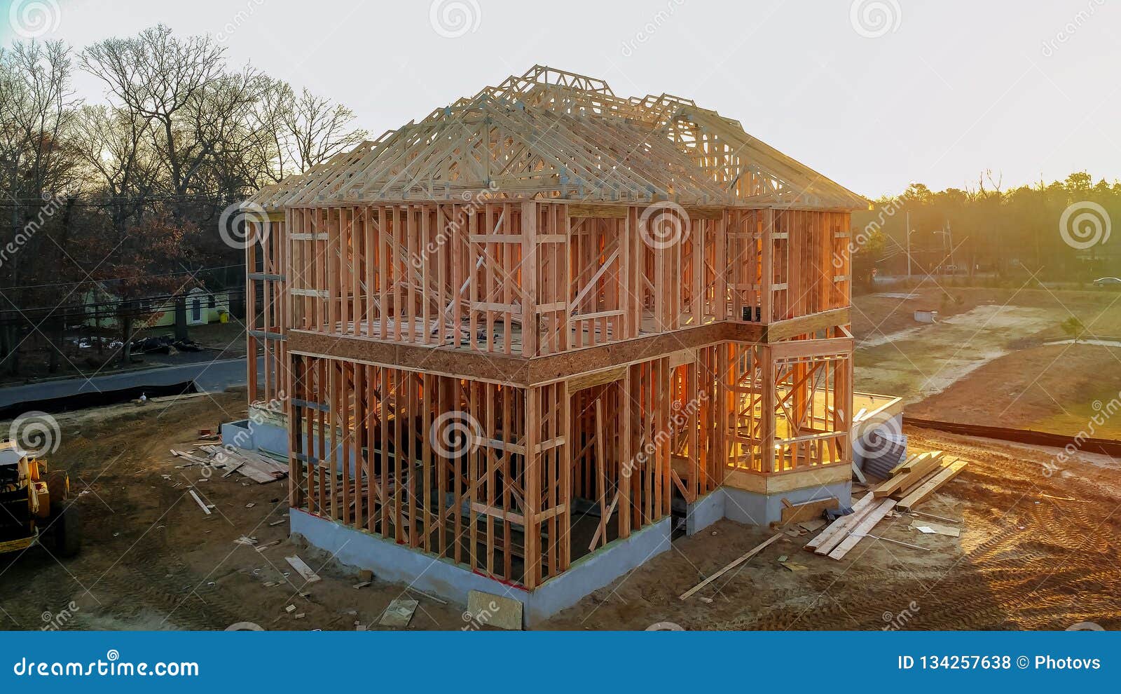 a stick built house under construction new build with wooden and beam framework