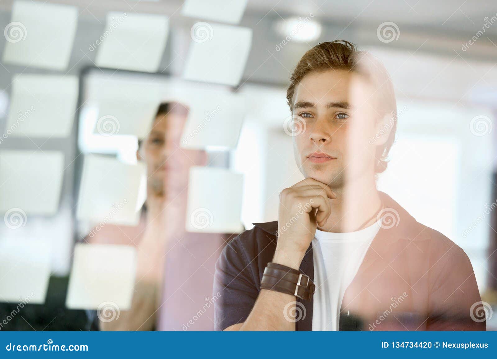 Stickynotes on a Glass Wall Stock Photo Image of person, note 134734420