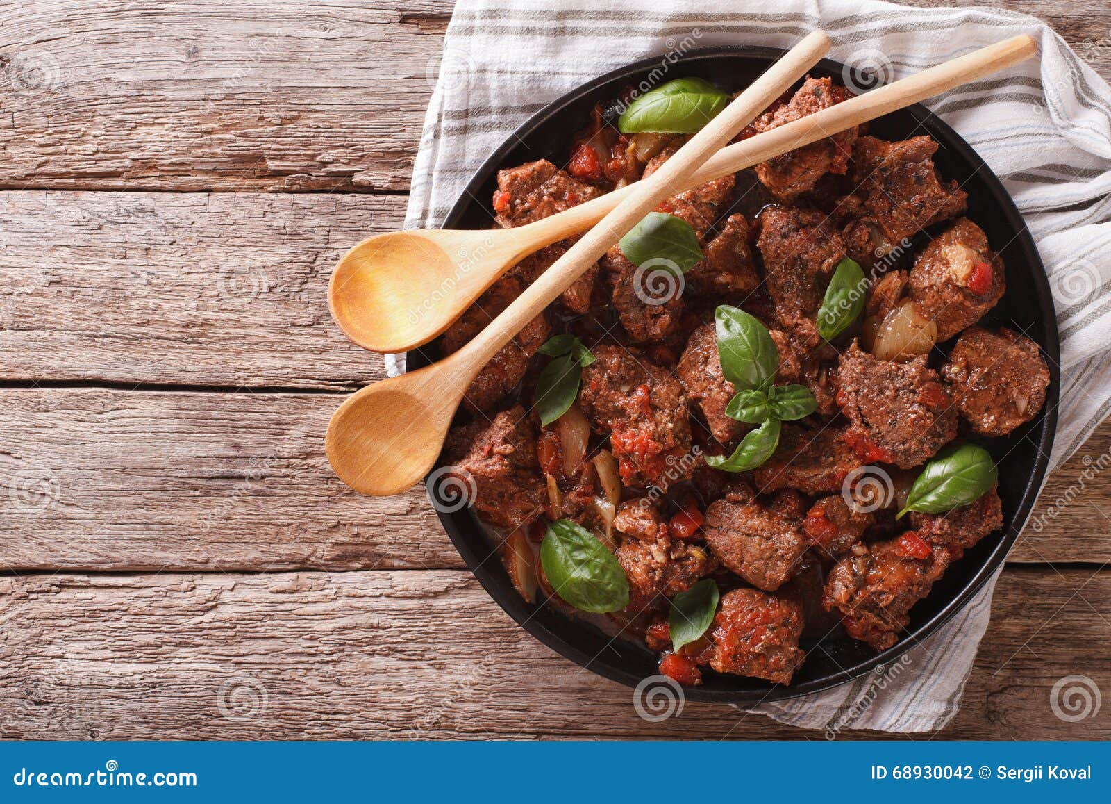 Stifado Beef with Sauce and Basil Close Up in a Dish. Horizontal Stock