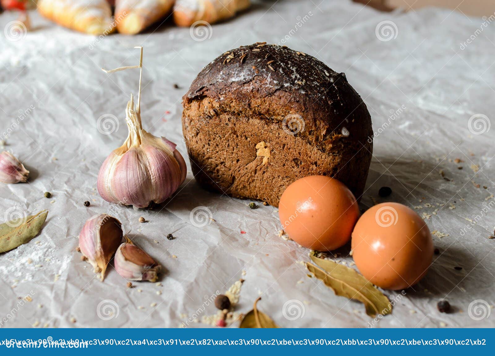 Still Life of Bread, Eggs, Garlic and Spices. Stock Photo Image of