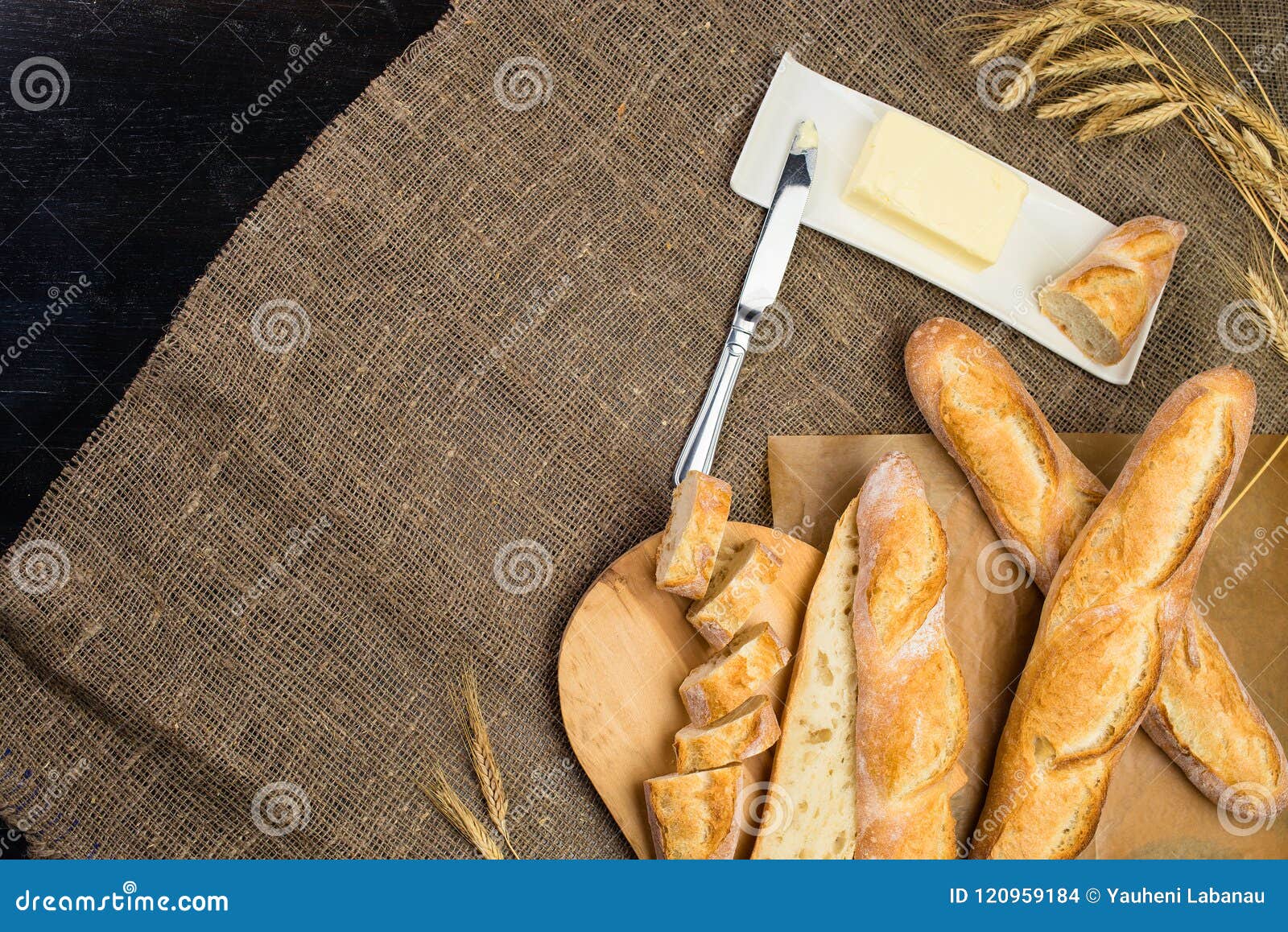still life with french fresh bread baguettes with poolish on a w