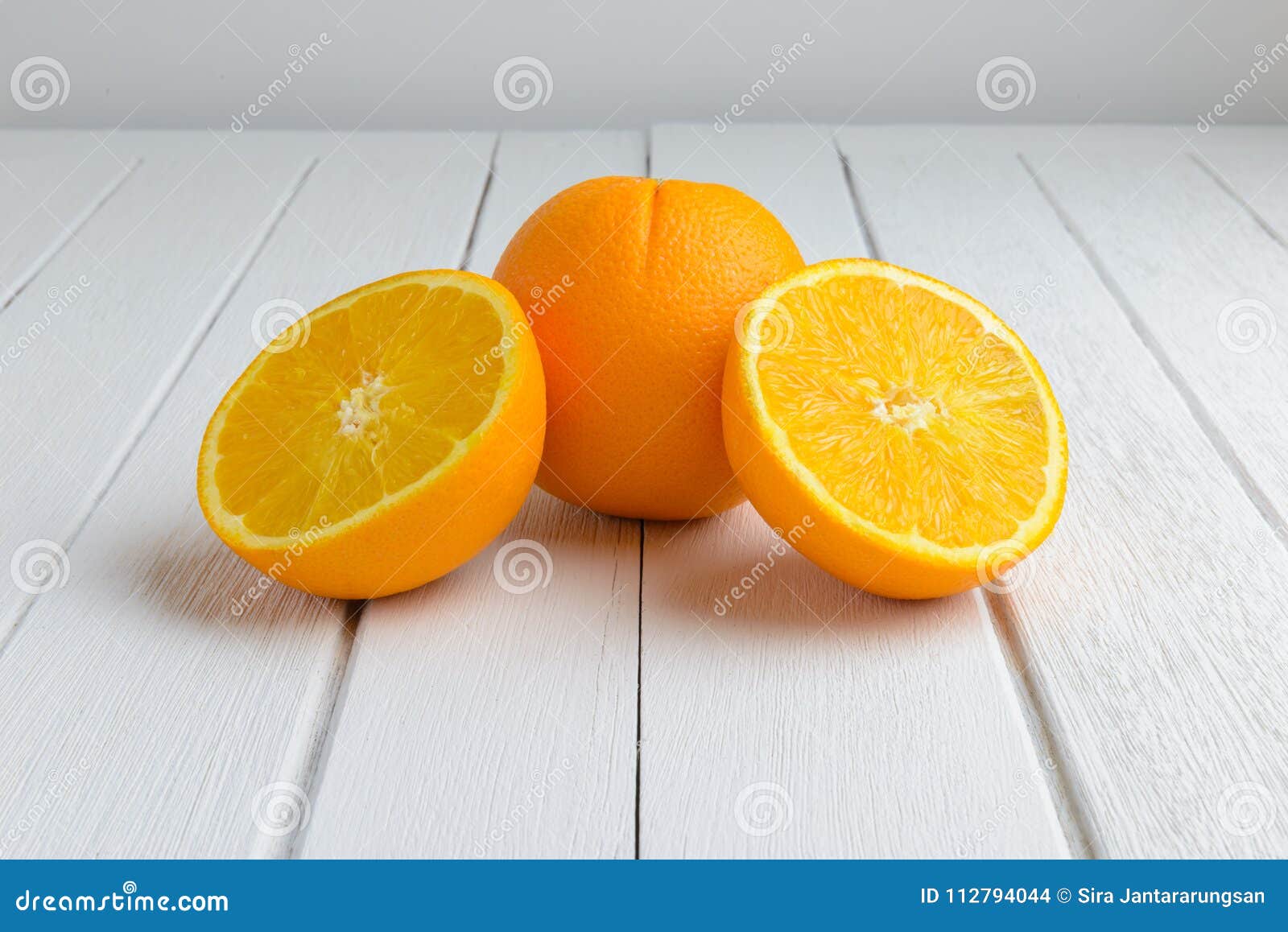 Still Life Fresh Orange Fruit on Vintage White Wood Table Stock Photo