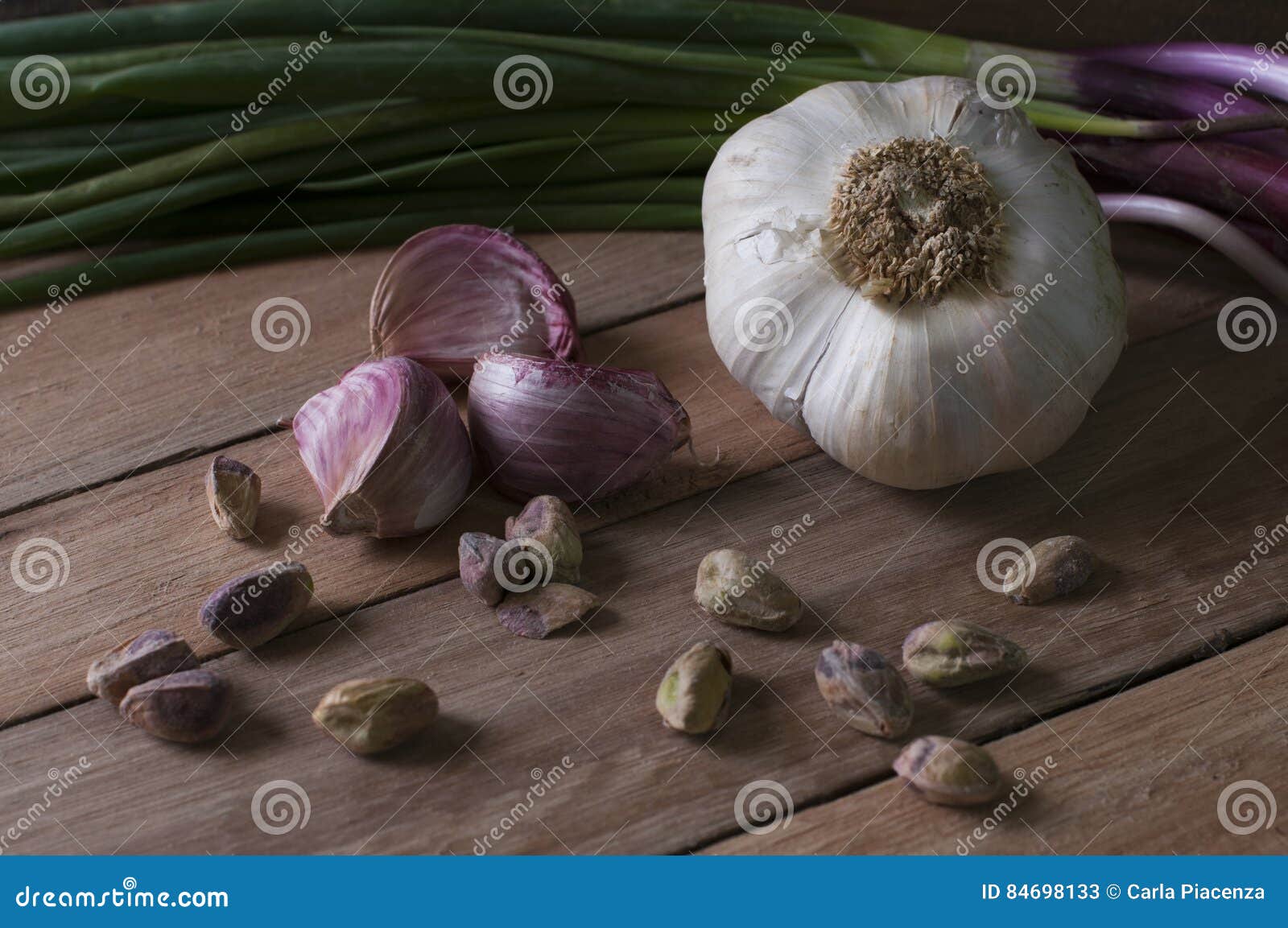 still life garlic, pistachio and leek