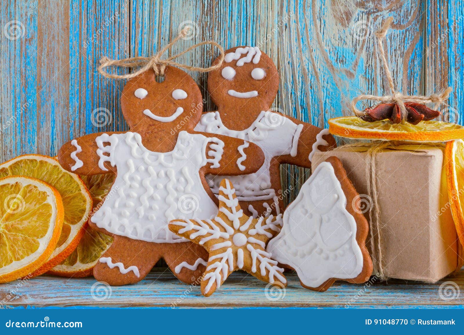 Still Life of Gingerbread, Gingerbread Men, Dried Oranges on Blue ...