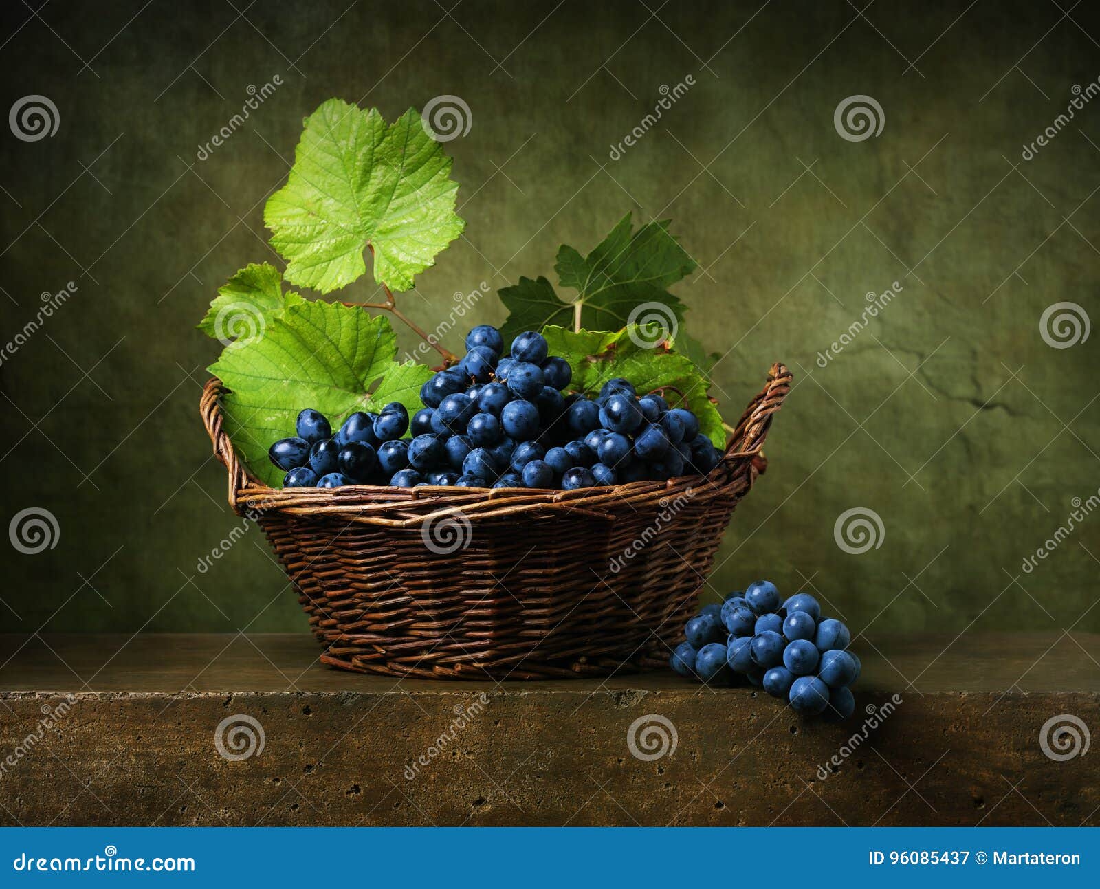 still life with grapes in basket