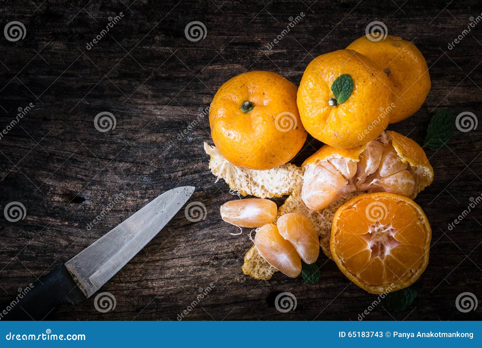 Still Life Oranges Fruit and Knife on Texture Wood. Stock Image - Image