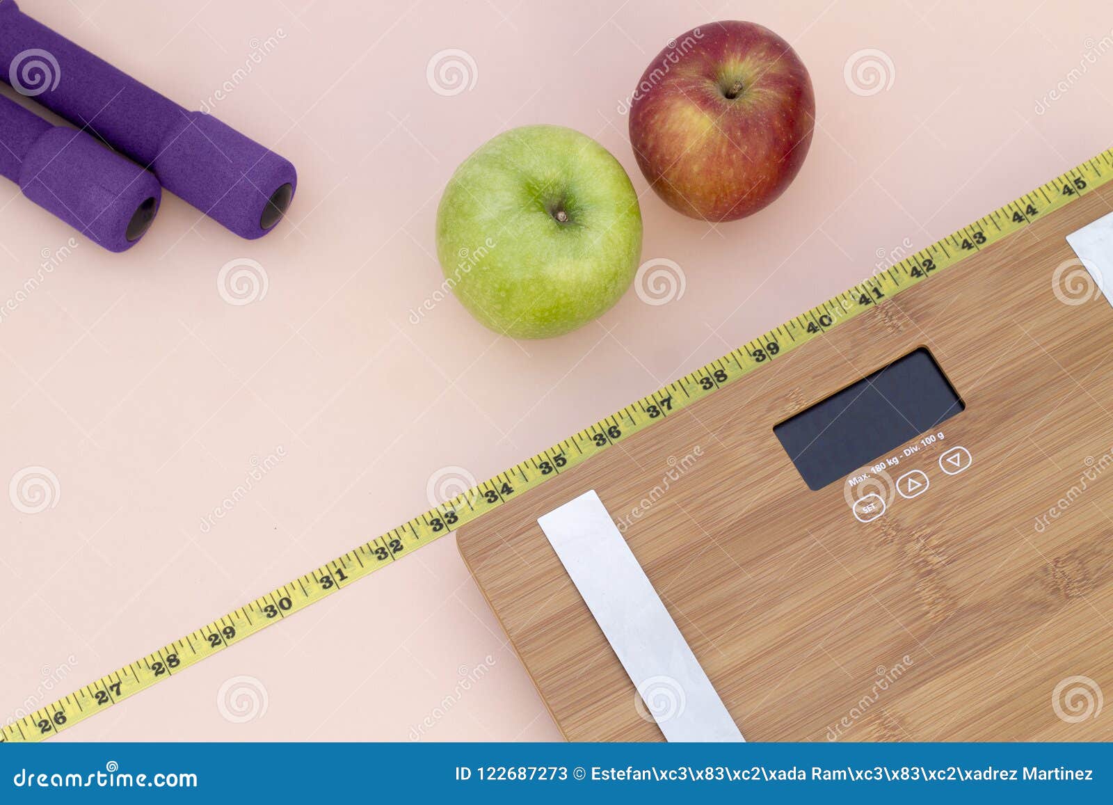 still life photography with apples, weight tape measure and a scale