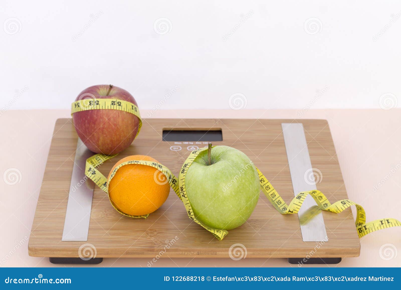 still life photography with fruits, tape mesaure and a scale