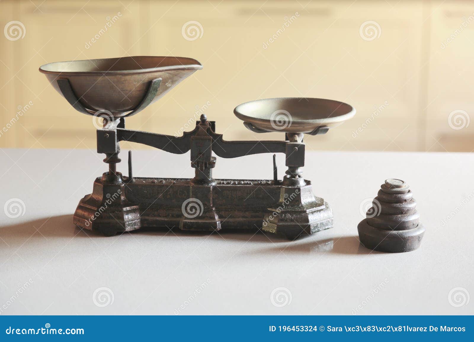 Old Obsolete Manual Weighing Scales and a Pile of Weights Stock