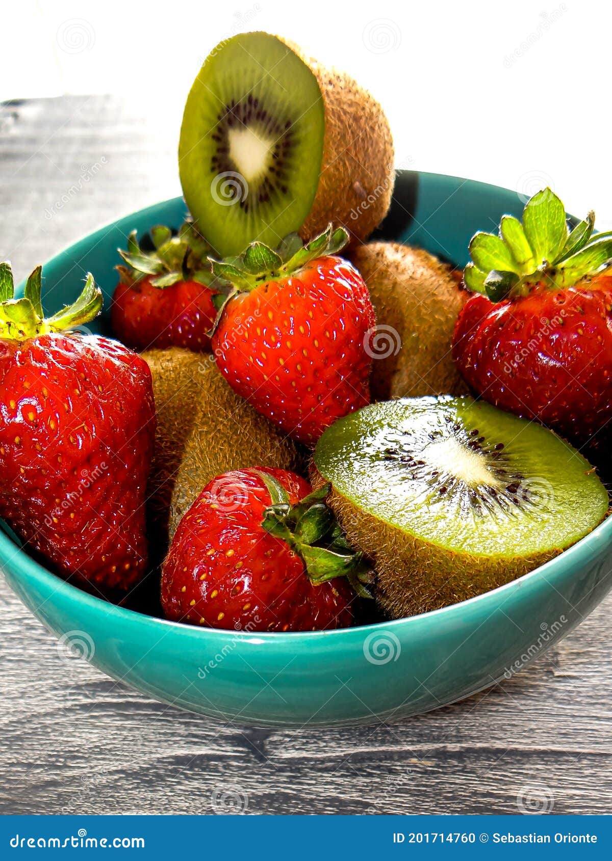 still life of strawberries and kiwis on the table