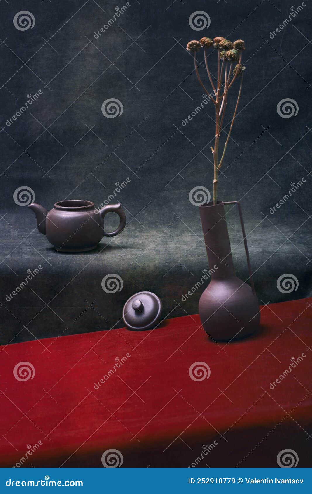 Still Life with a Vase of Flowers and a Kettle with a Lid Stock Image