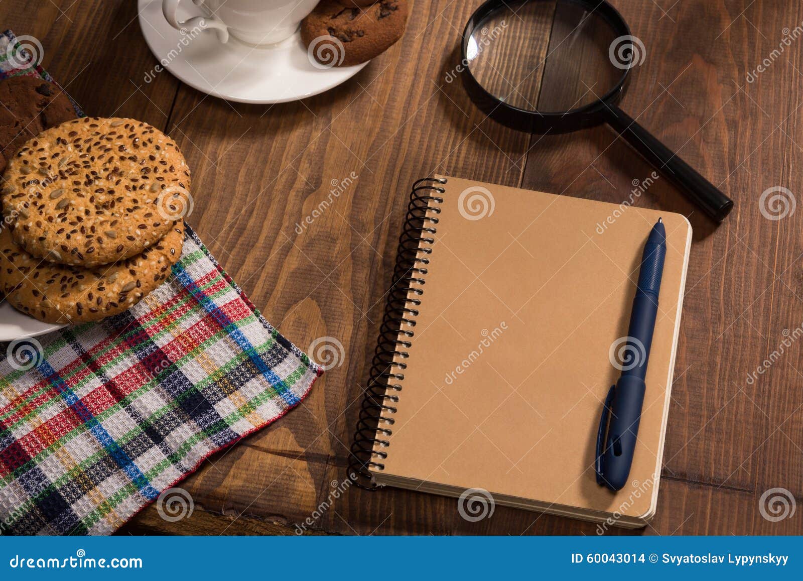 stilllife with a notebook on the wooden table