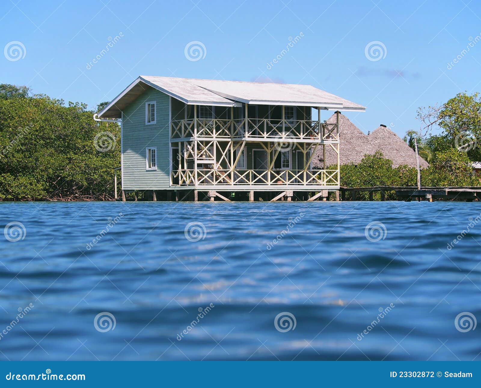 Stilt hotel over the sea stock photo. Image of idyllic 23302872
