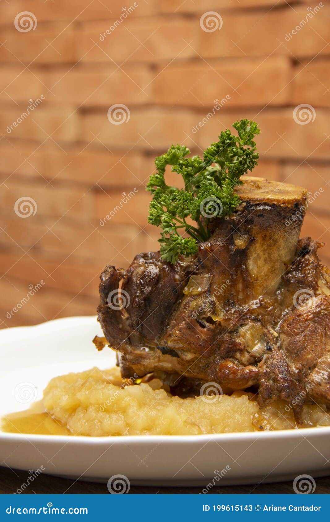 stinco pork with green apple puree. traditional eisbein