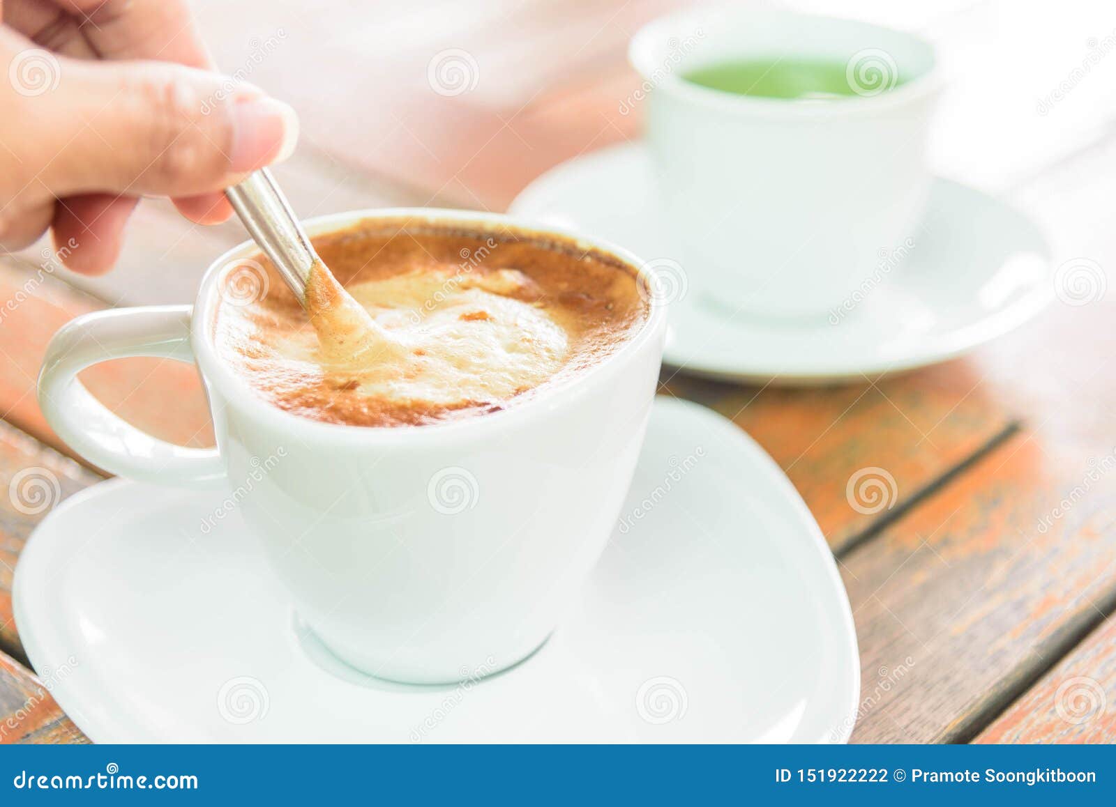 Stir the coffee in cup stock photo. Image of hand, breakfast 151922222