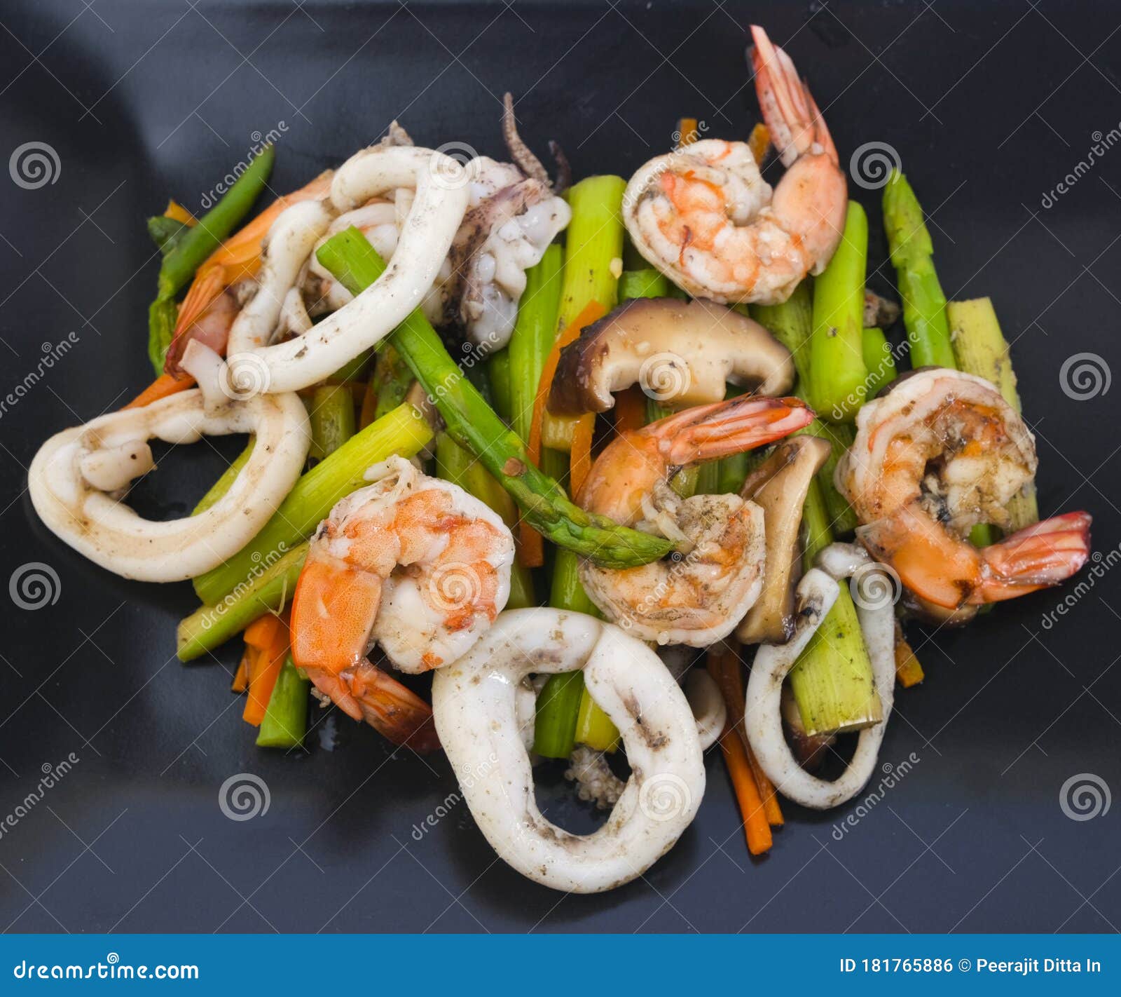 Stir Fried Asparagus with Squid and Shrimp with Oyster Sauce Stock