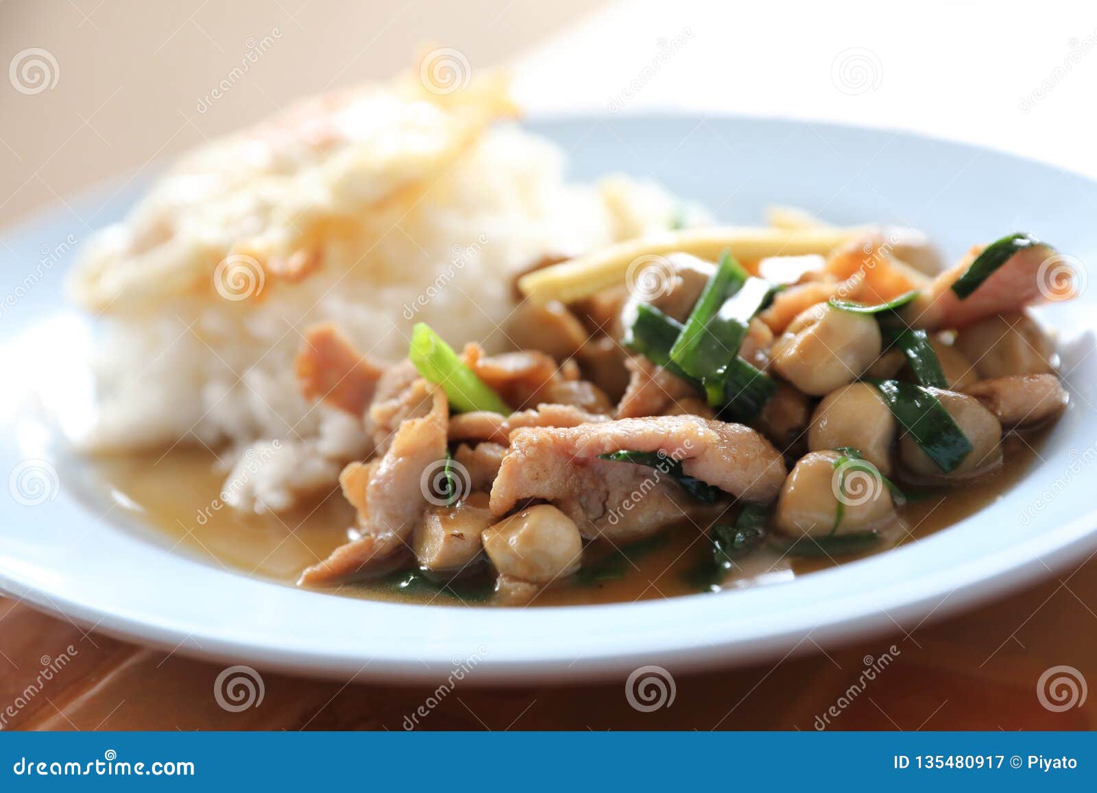 Stir Fried Oyster Sauce with Pork and Rice with Fried Egg on Top , Thai