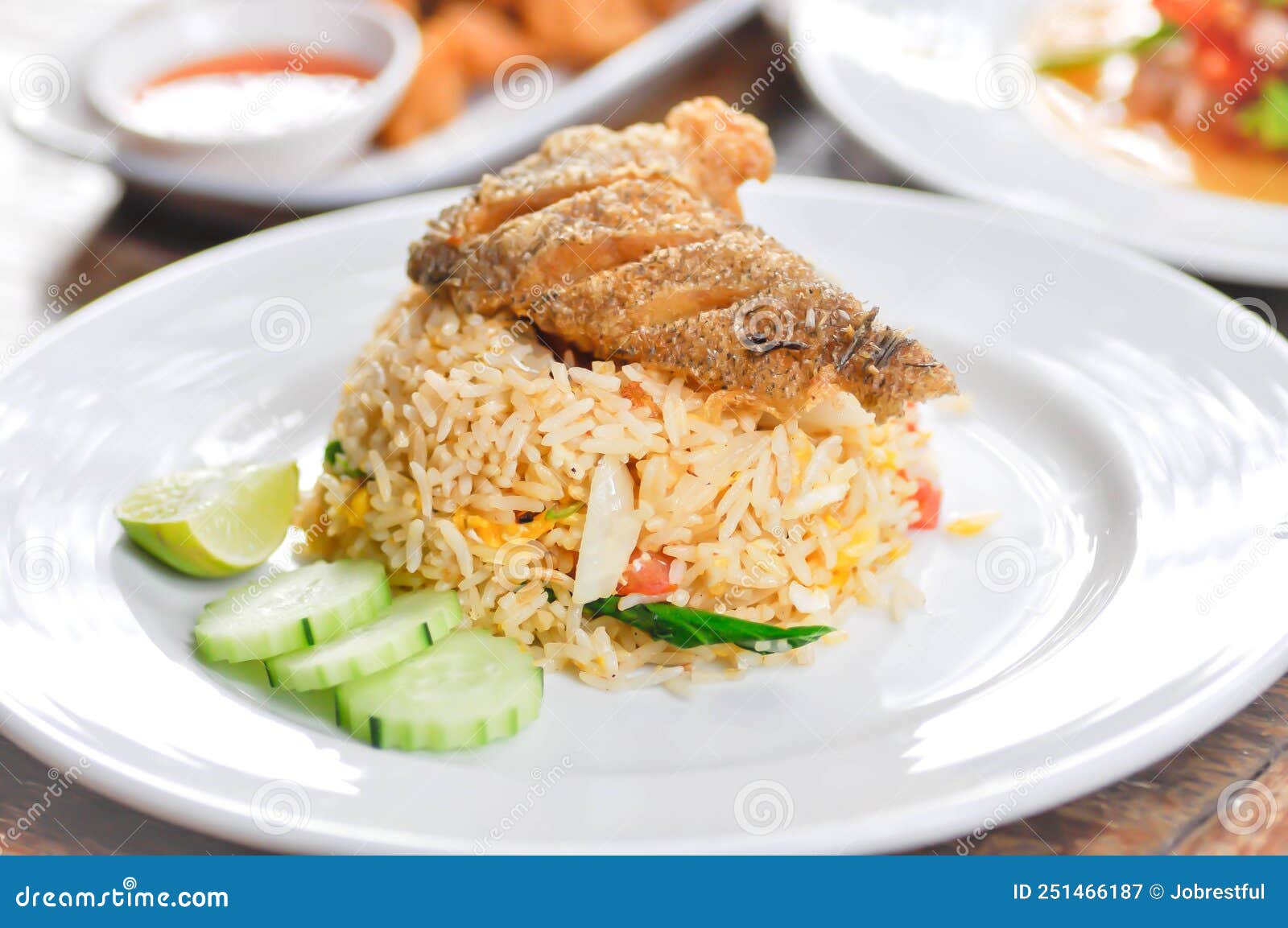 Stir Fried Rice or Fried Rice with Fried Fish Topping , Fish and Rice