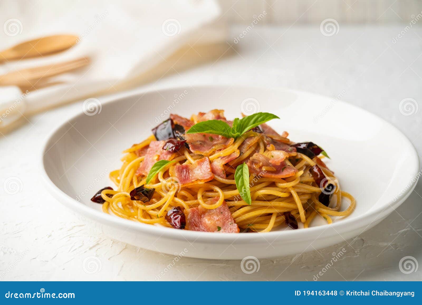 StirFried Spaghetti with Dried Chili and Crispy Bacon Stock Photo