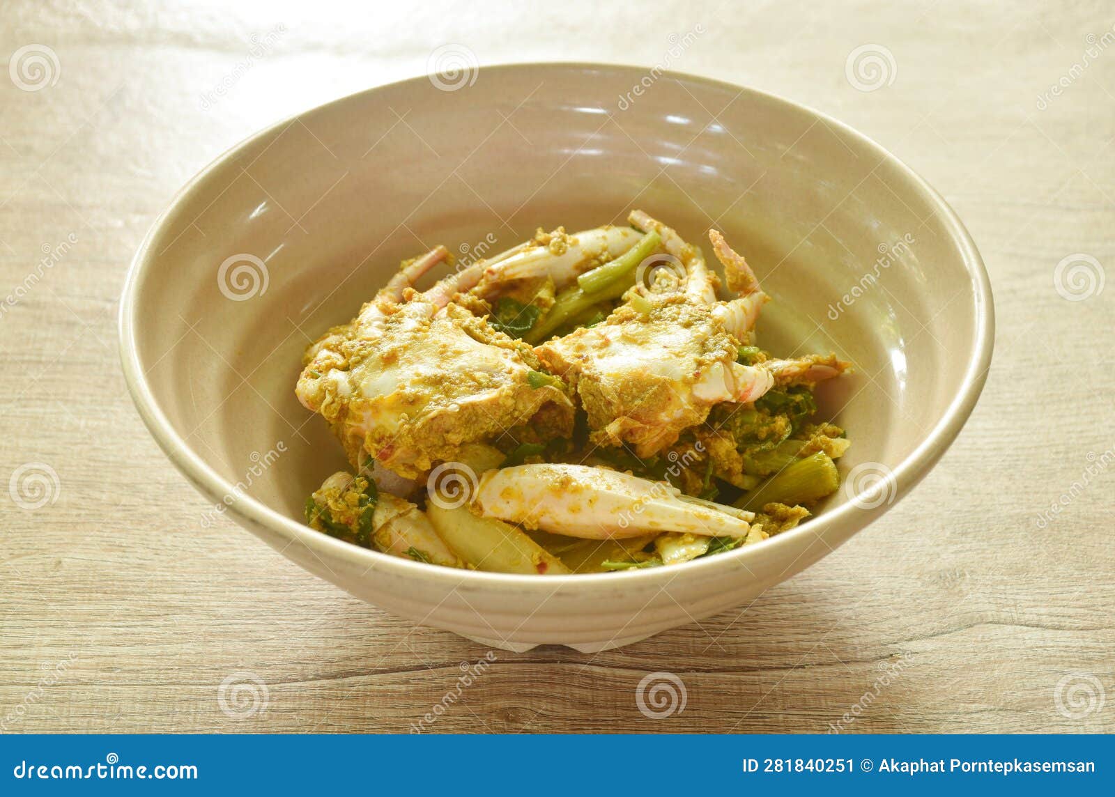 Stir Fried Swimmer Crab in Yellow Curry and Egg on Bowl Stock Image
