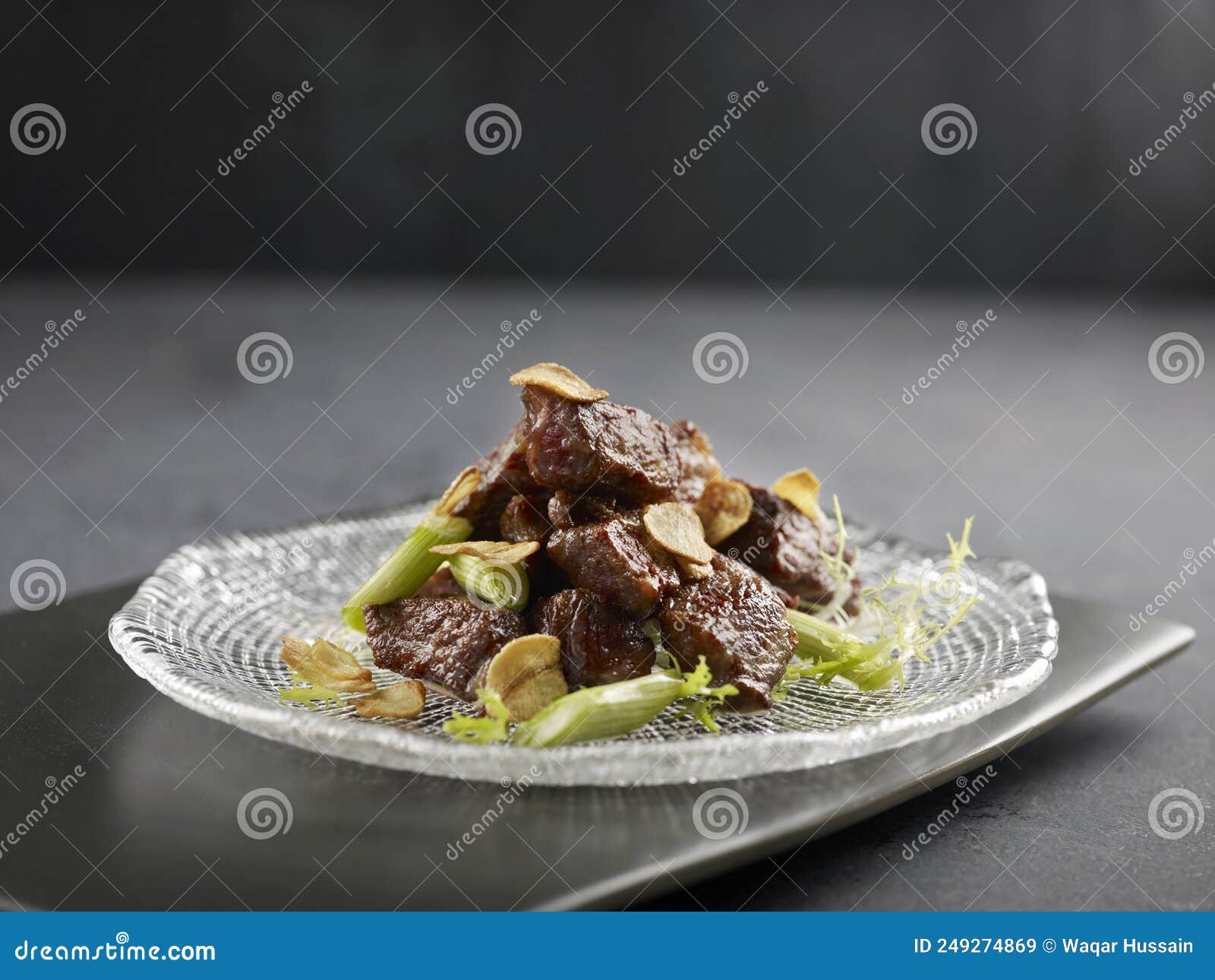 Stirfried US Angus Beef Cube with Foie Gras Pate Served in a Dish Side