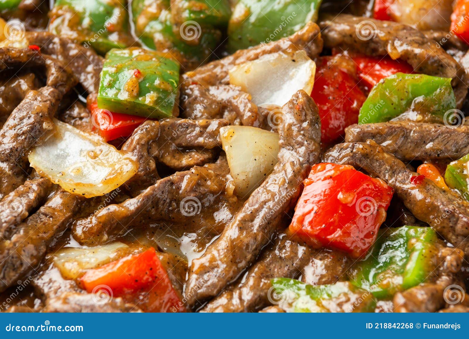 Stir Fry Chinese Pepper Beef Steak with Onion, Red and Green Bell