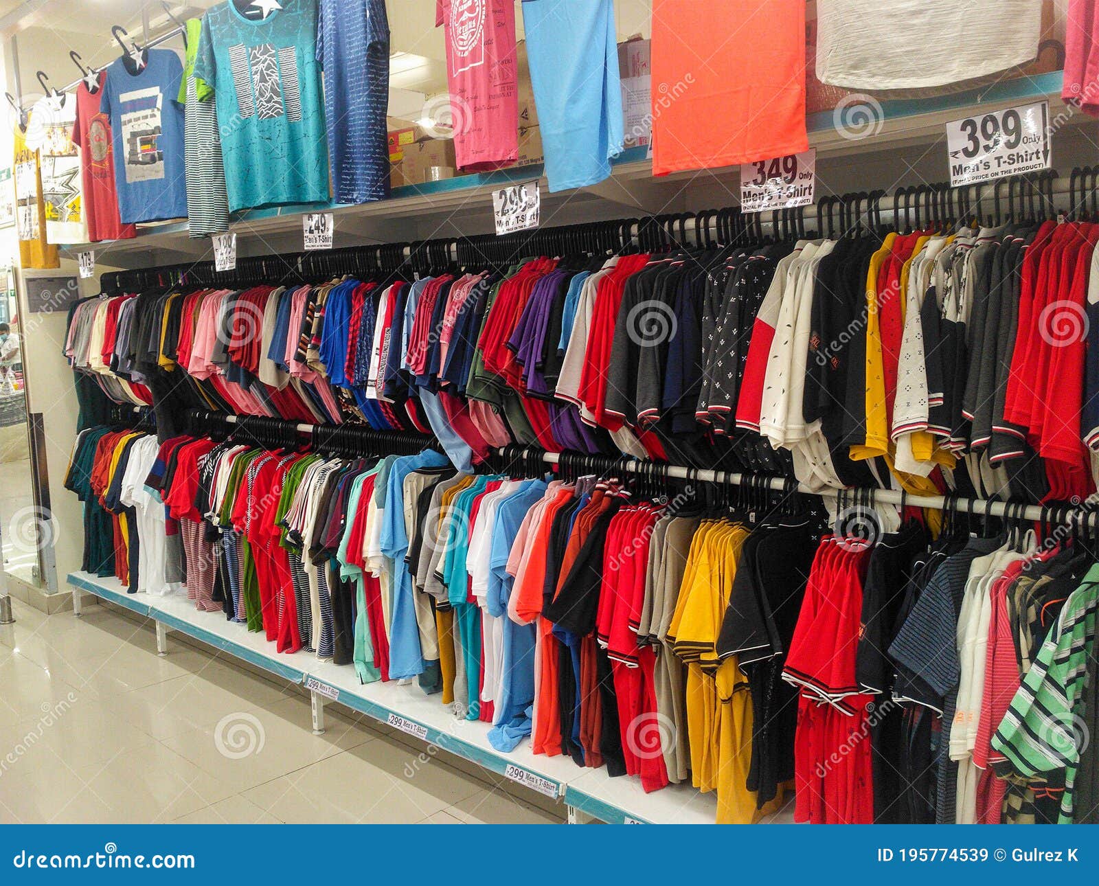 Stock Clearance Sale-T-shirts Hanging in a Super Market, India