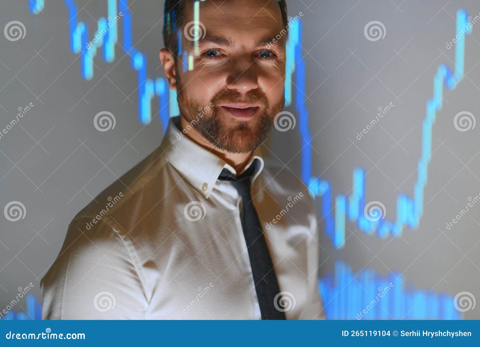 stock market top trader looks at projected ticker numbers and graphs running, analysing data to make best sell. behind