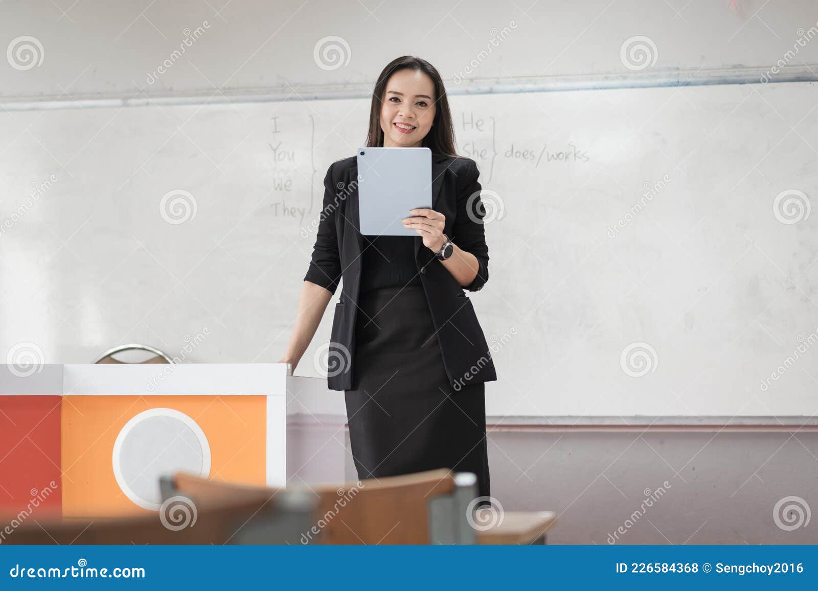 asian woman Thai teacher at school in khaki suit uniform, Generative AI  23998670 Stock Photo at Vecteezy