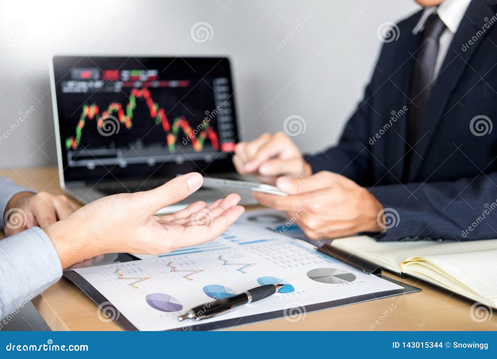 Stock Traders Looking At Finance Analysis Marketing Report ...