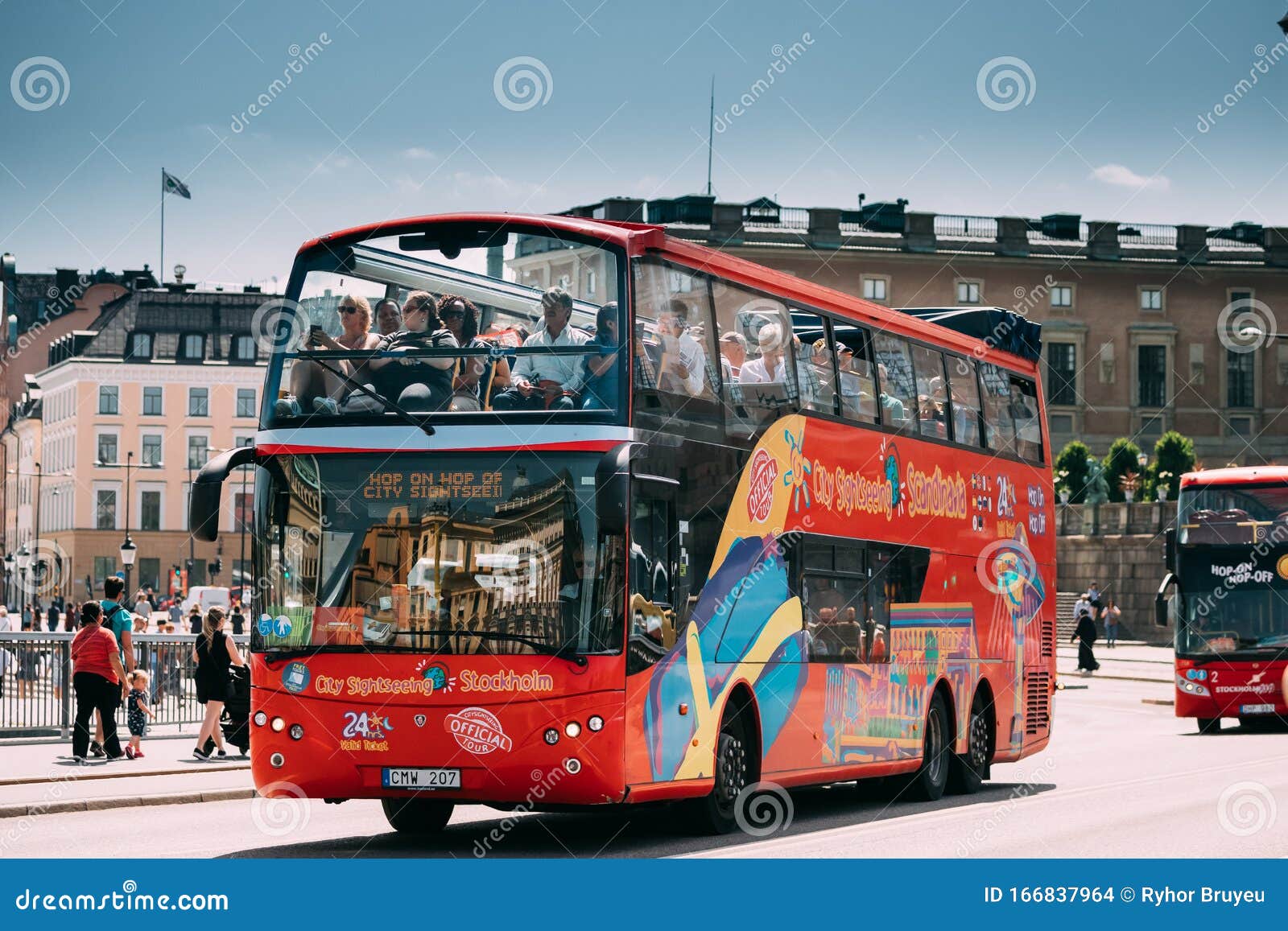 Stockholm, Sweden. Tourists People Ride in Red Hop on Off Touristic Bus for Sightseeing Down the Near Editorial Stock Image - Image of landmark, 166837964