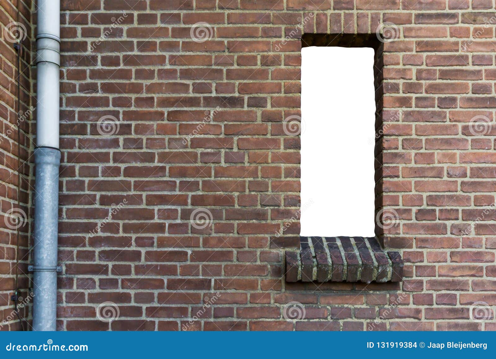 Stone Brick Wall with a Cut Out Open Empty Window Isolated with White