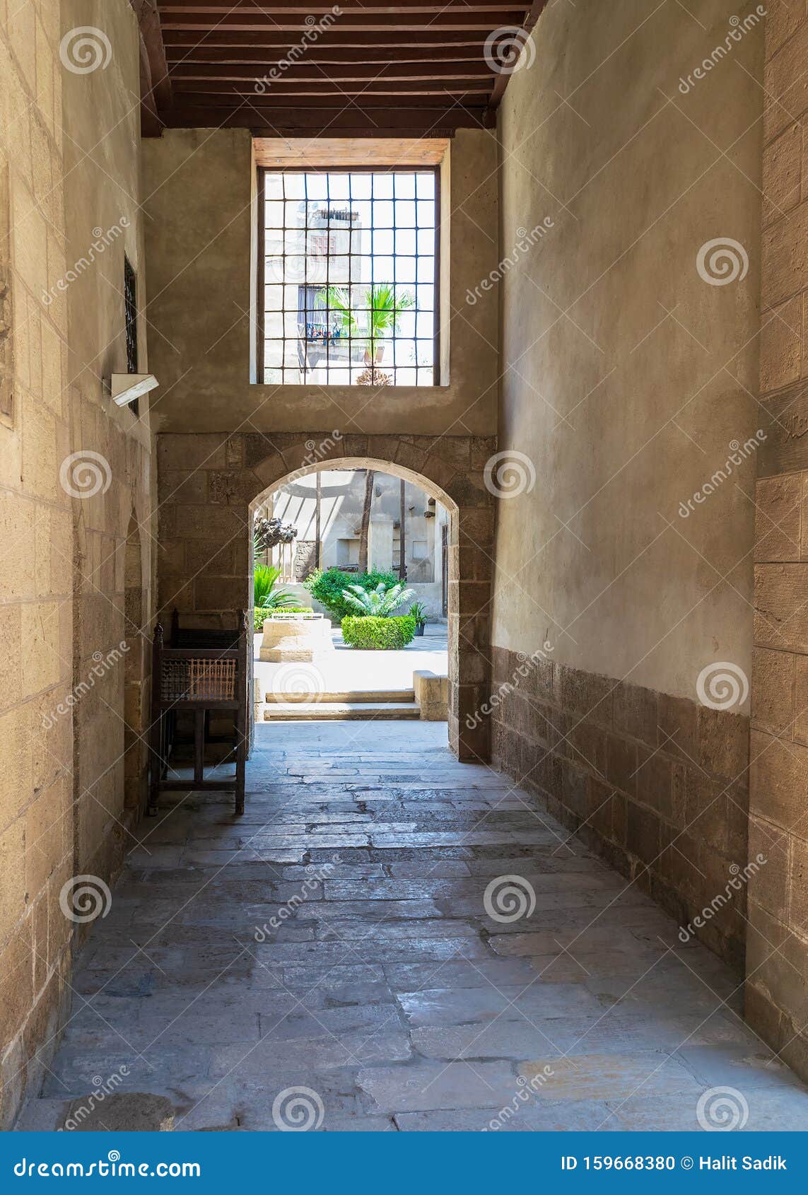 stone bricks passage leading to the courtyard of historic beit el sehemy house, cairo, egypt