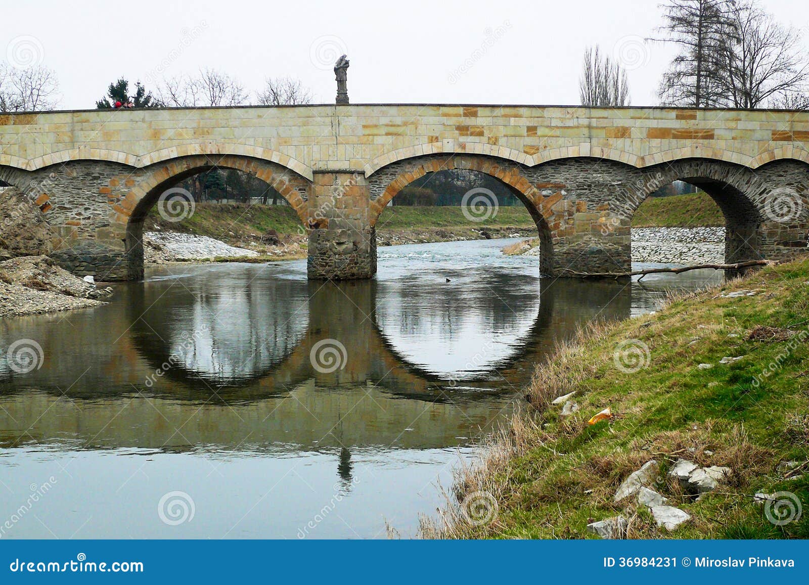 stone bridge with the statue of st. john of nepomuk in litovel