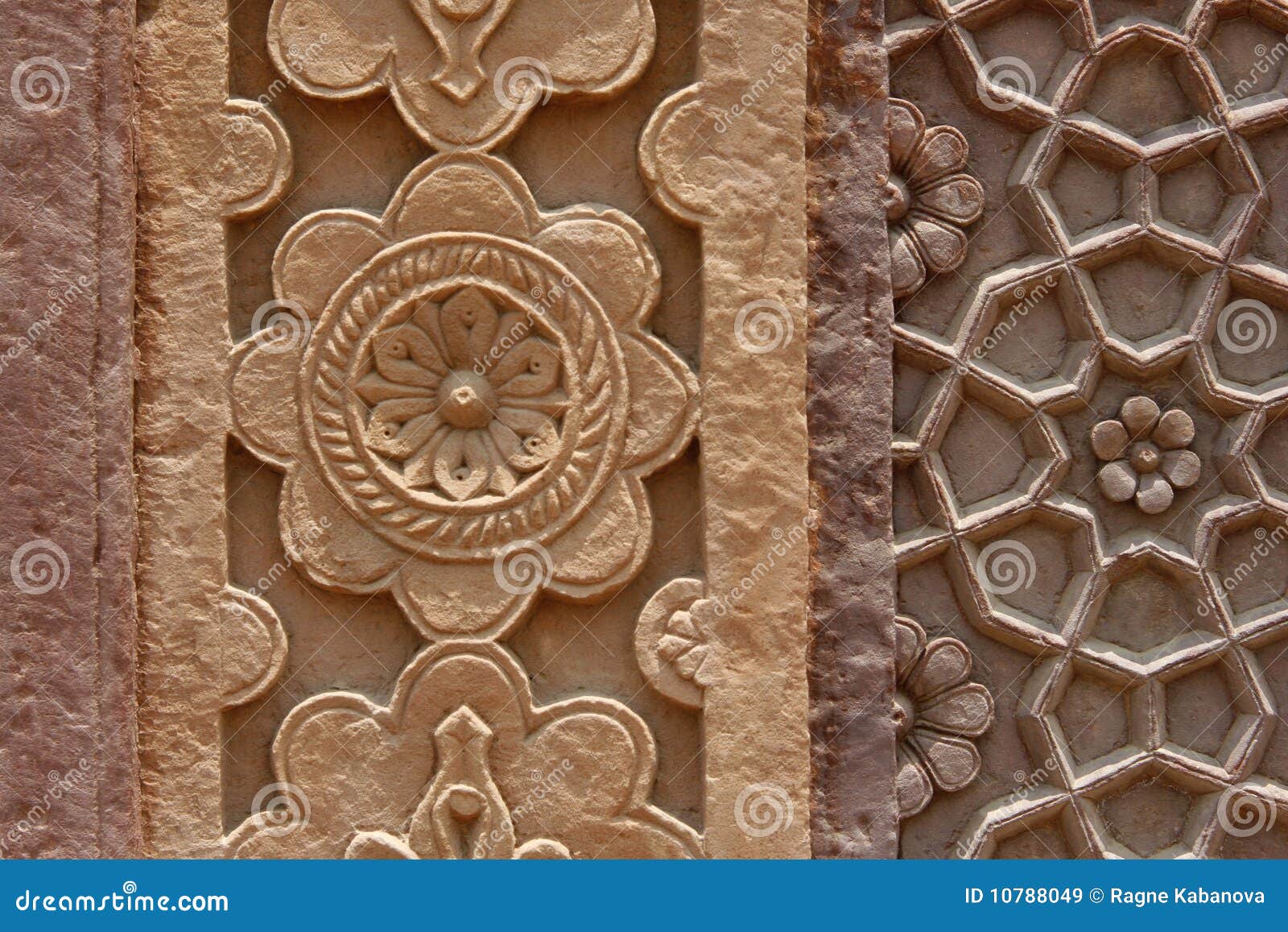 Stone Carvings On The Wall Of A Temple In India Royalty Free Stock