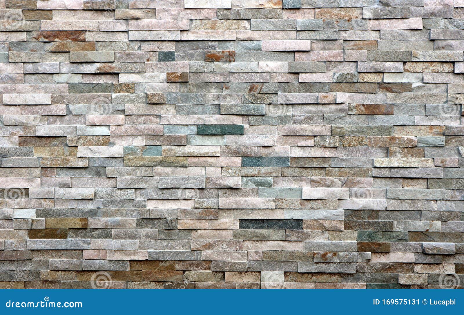 Stone Cladding Wall Made of Striped Stacked Slabs of Natural Multicolor