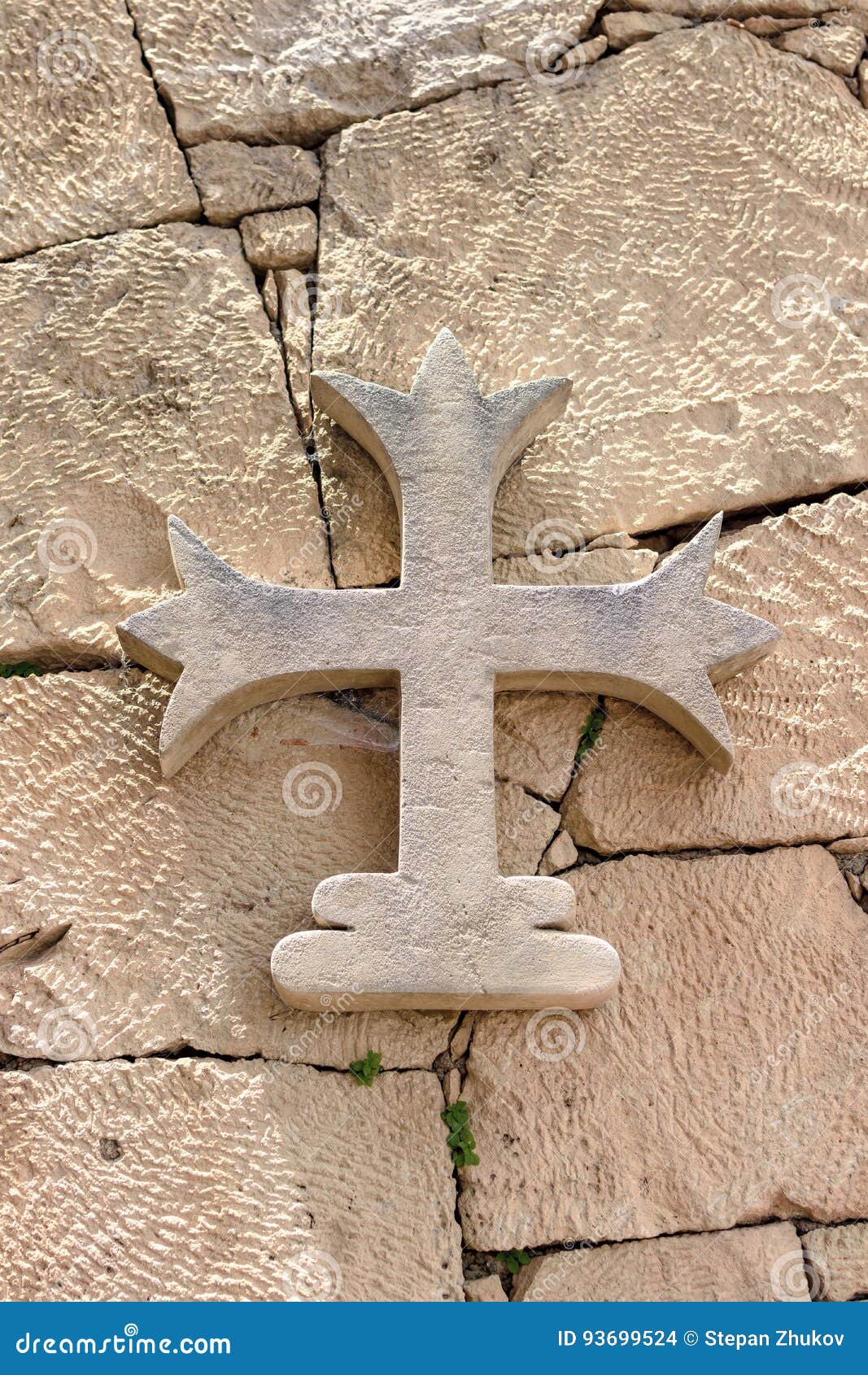 Stone Cross Hanging on a Stone Wall, Background Stock Photo Image of