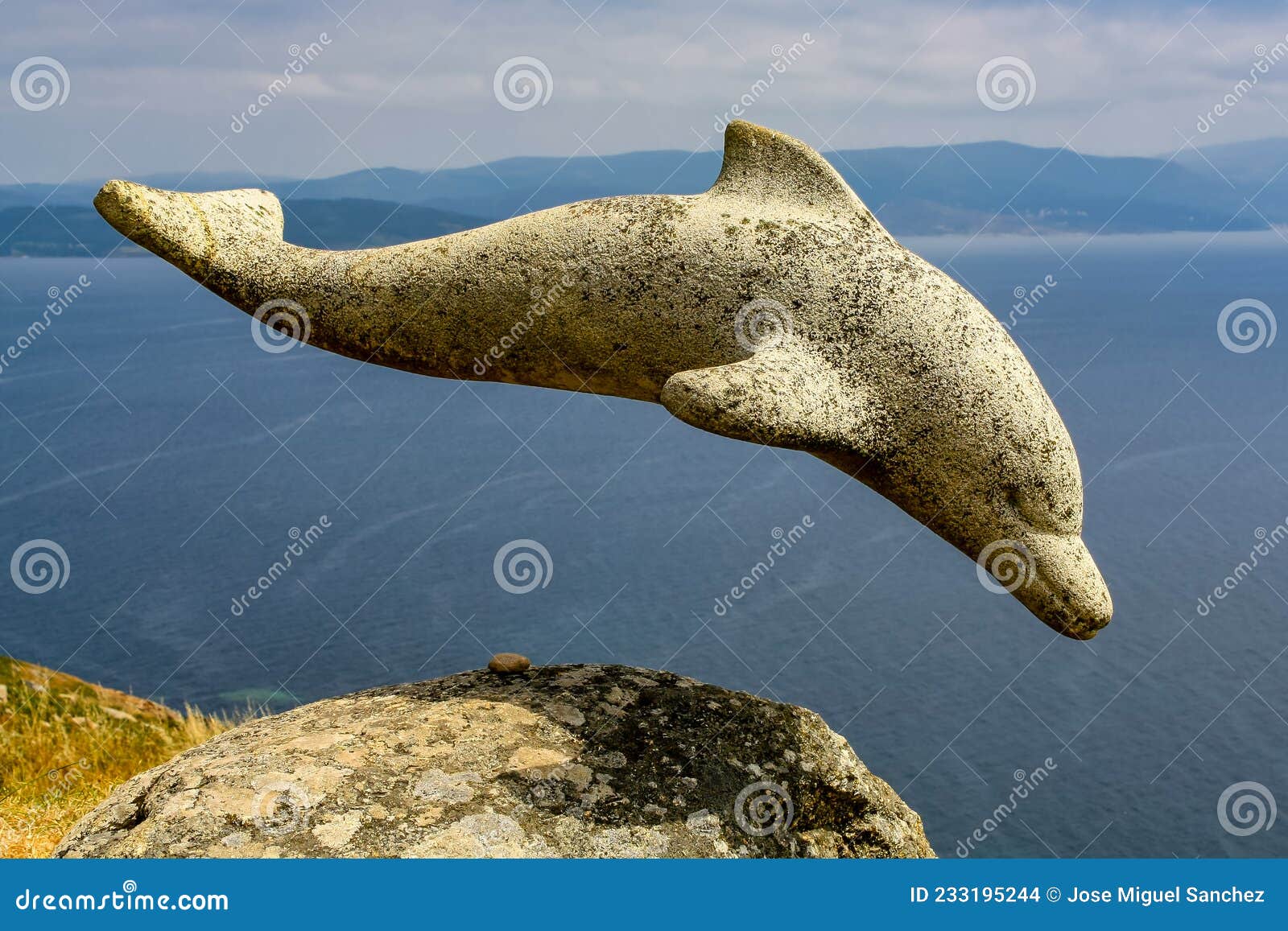 Stone Dolphin Sculpture on a Cliff in Galicia. Spain. Editorial Stock