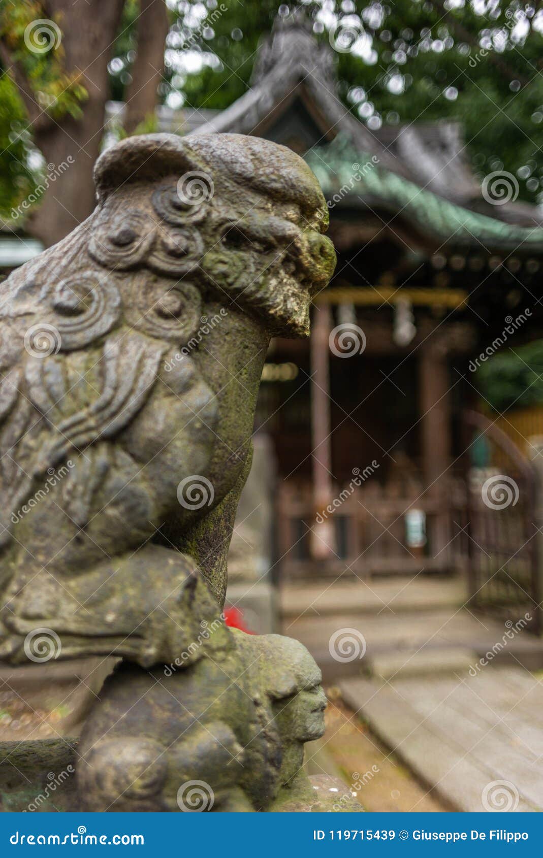 a stone dragon in a shintoist shrine in tokyo